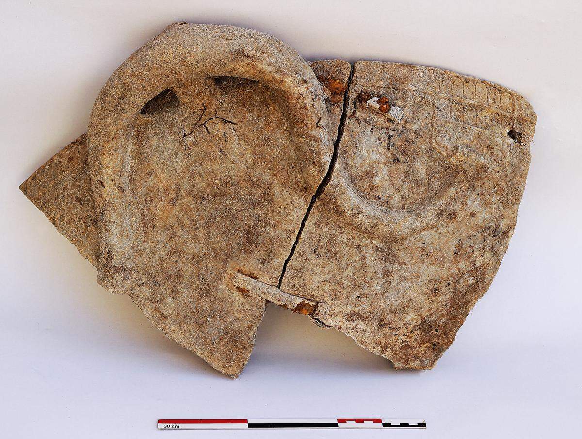 Repaired fragments of the ritual wash basin found at the 2,600-year-old temple.