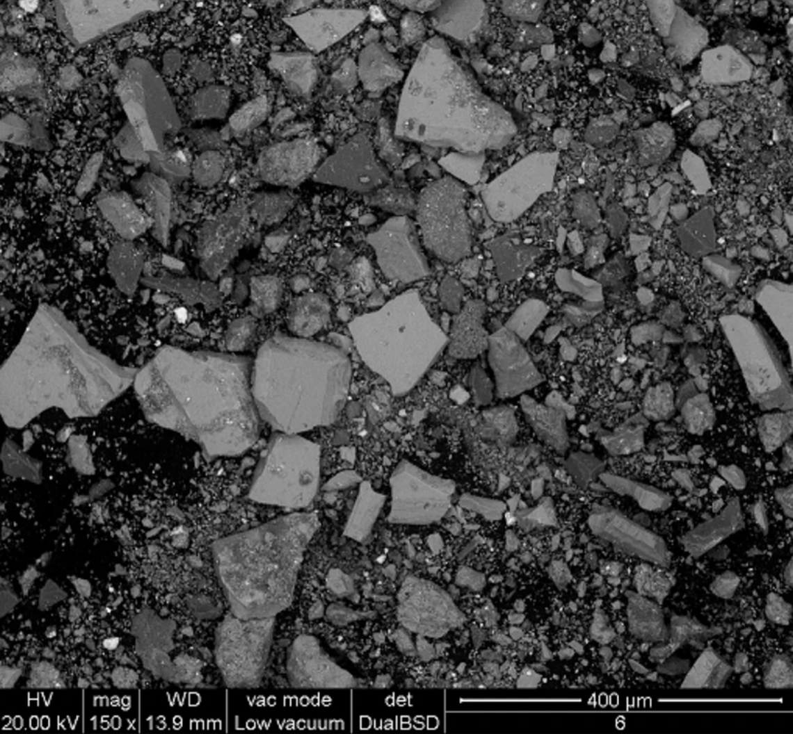 The ancient lip paint from Jiroft as seen under a microscope without any added digital coloring.