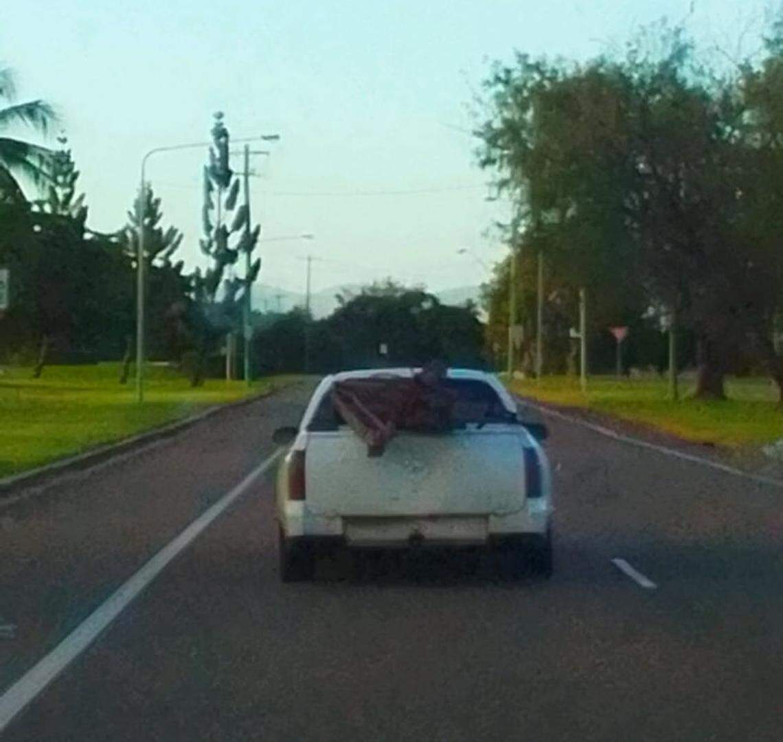 The white vehicle believed to have copper gutters sticking out the back.
