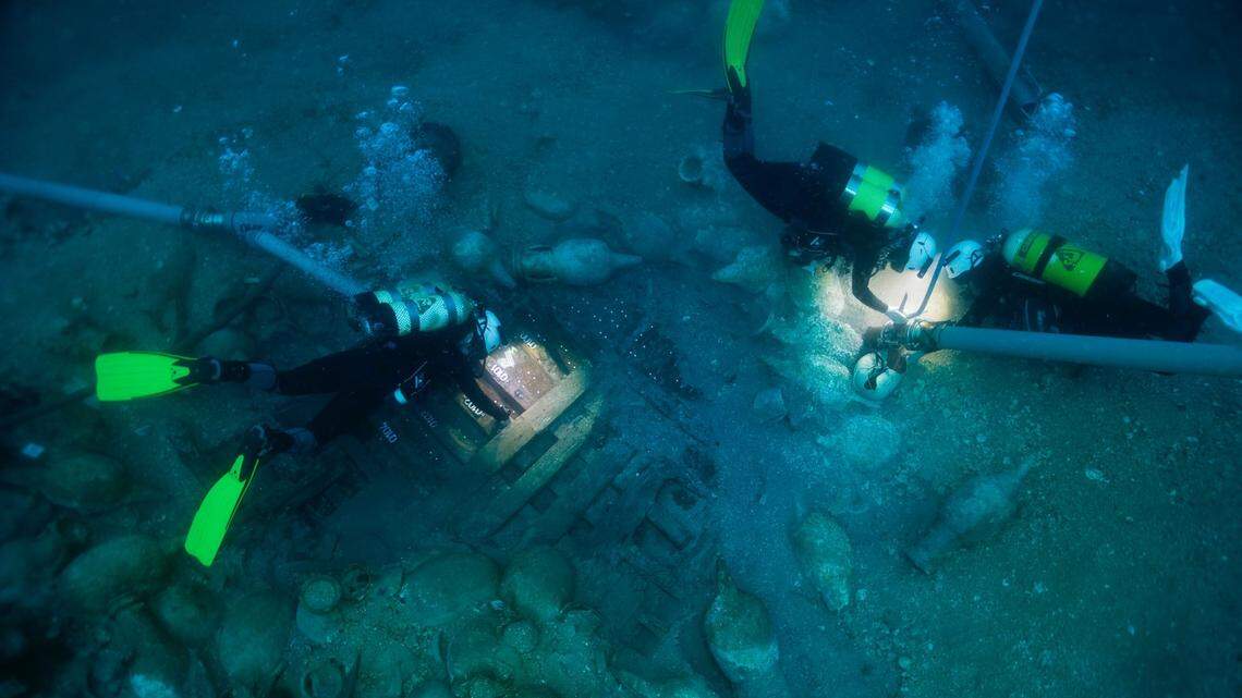 Divers and archaeologists removed ancient Roman pottery from a sunken ship in Spain and found unique numerals on the wood, a museum said.