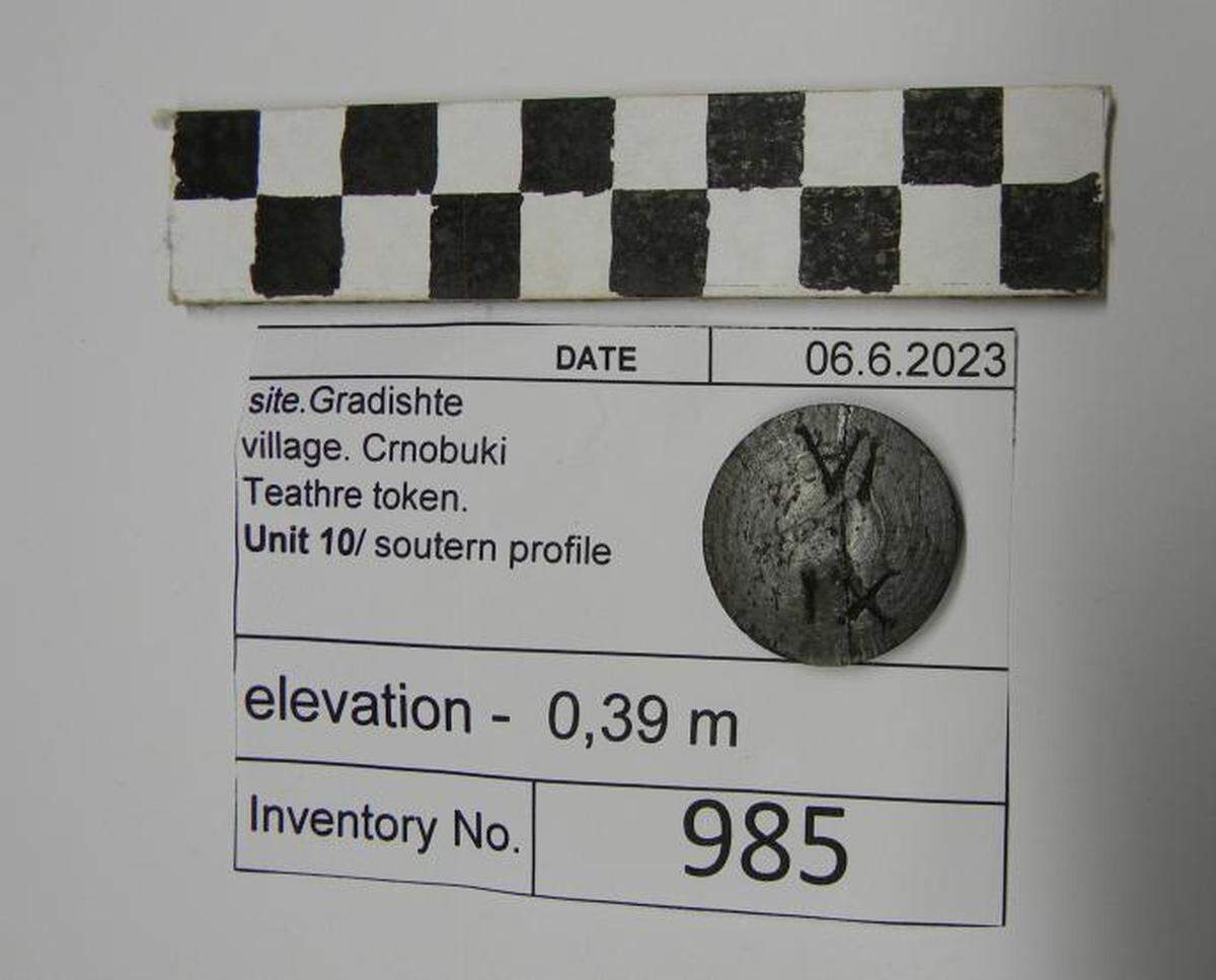 An ancient theater ticket found at the Gradishte site.