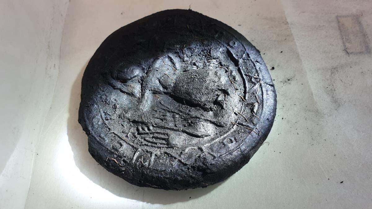 Another view of the ancient Communion bread with a Jesus figure found at Topraktepe.