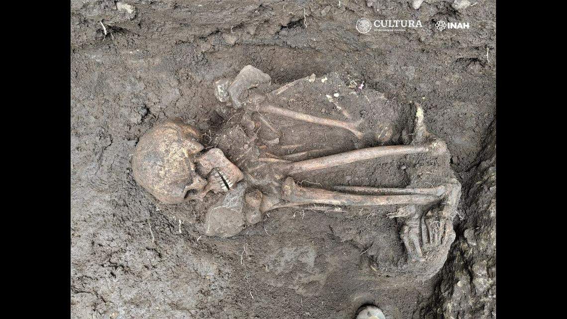 The grave was found by residents in Morelos after heavy rains, officials in Mexico said.