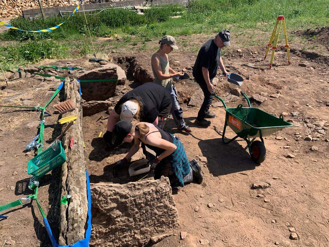 Archaeologists excavate the burial in Tiarp.