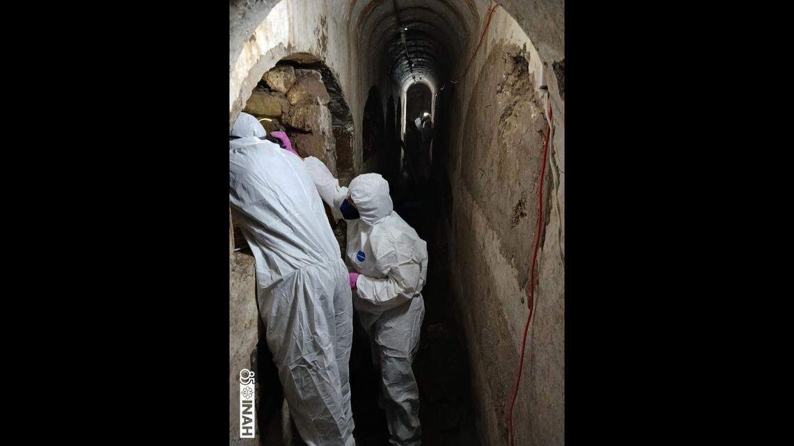 Archaeologists and students excavated three century-old graves in walls of a church crypt in Hueypoxtla. Photos show what they found.