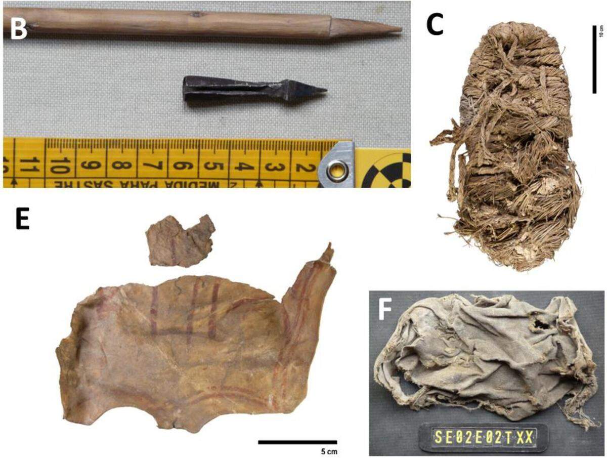 Some human artifacts found in the bearded vulture nests, including a crossbow bolt (B), 650-year-old grass sandal (C), 630-year-old decorated leather piece (E) and another fabric piece (F).