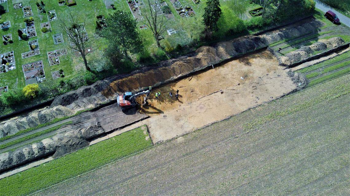 Two ancient urns were discovered at the same cemetery in 1956 and 1967, officials said.