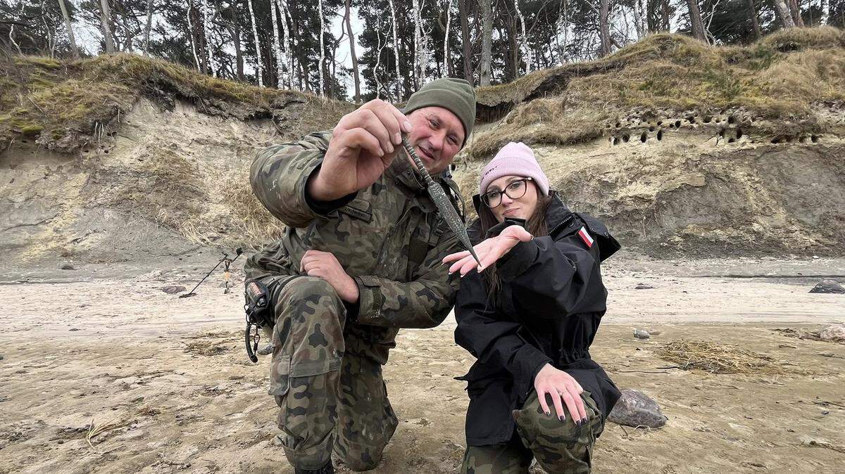 Metal detectorists searching a beach in Poland after a storm found a 2,500-year-old dagger, a museum said. Photos show its detailed design.