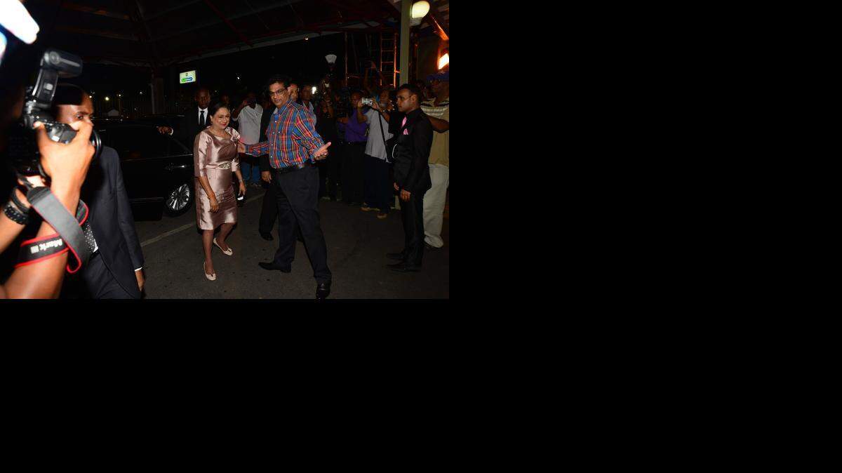 
Prime Minister Kamla Persad-Bissessar arrives at the hospital Sunday night to visit hunger striker Wayne Kublalsingh.
