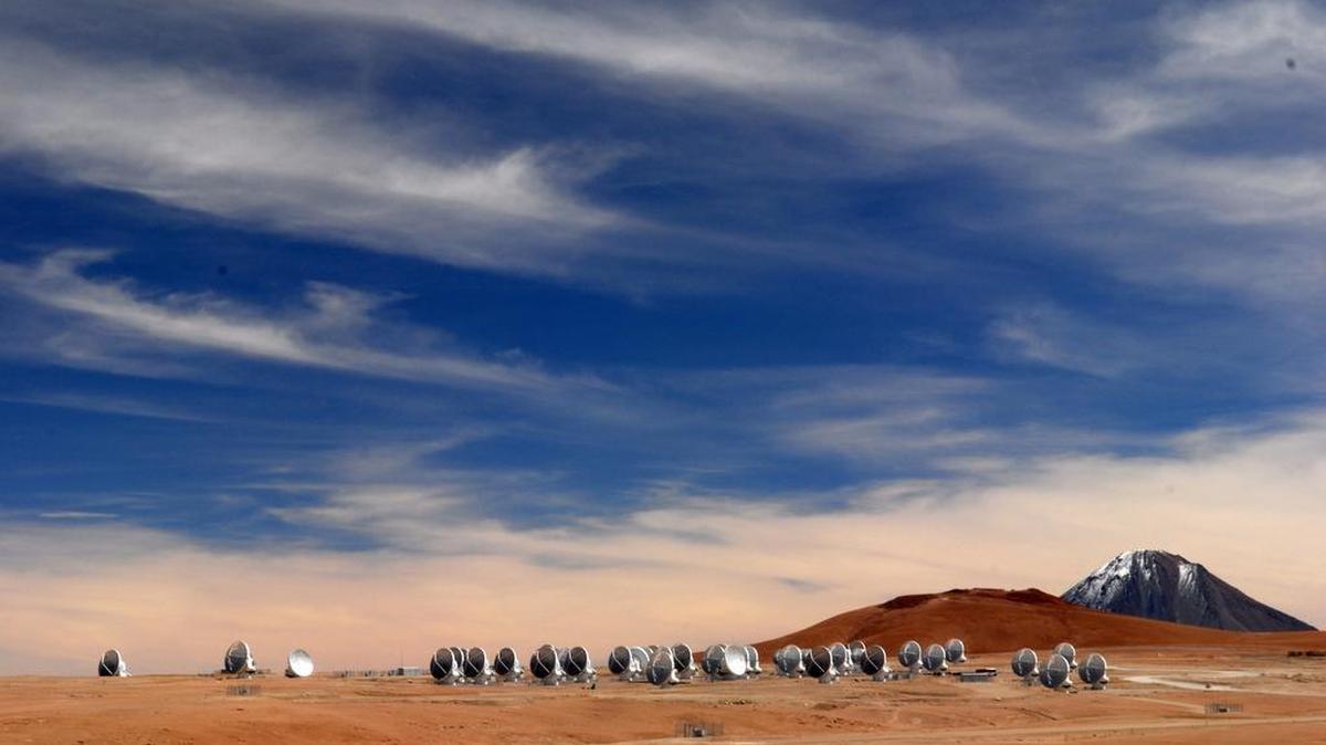 
A fleet of dishes, each weighing more than 100 tons, would create the effect of a single, giant telescope able to capture light that had traveled for more than 10 billion years.
