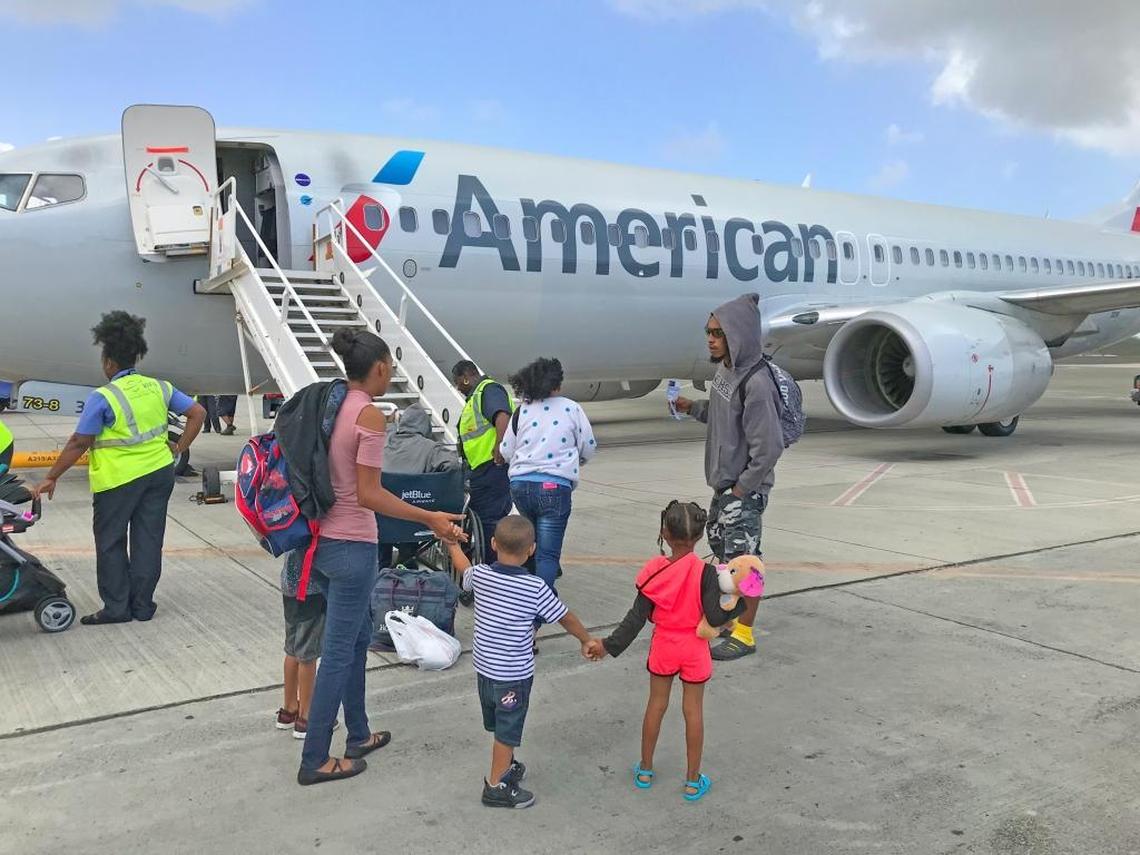 Sharon Emile, her husband Niko and three kids were among 135 people who finally got to leave St. Croix on Tuesday aboard an American Airlines humanitarian flight to Miami.