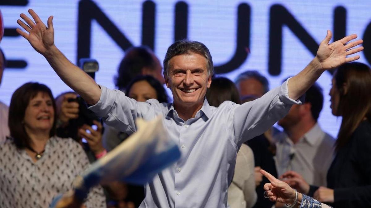 Supporters cheer top opposition presidential candidate Mauricio Macri in Buenos Aires, Argentina, Sunday, Oct. 25, 2015. Opposition leaders claimed Sunday night that Macri had gotten enough votes in Argentina’s presidential election to force a runoff against ruling party presidential candidate, Buenos Aires Gov. Daniel Scioli.