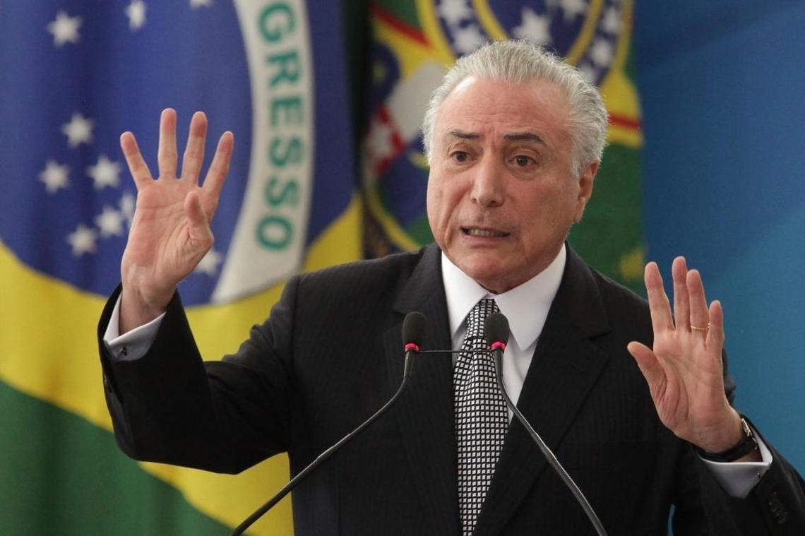 Brazil's President Michel Temer speaks during the inauguration ceremony for his new Culture Minister Sergio Sa Leitao at Planalto presidential palace in Brasilia in July. In early August, Brazil’s House of Deputies decided not to send corruption charges against Temer to the Supreme Court.