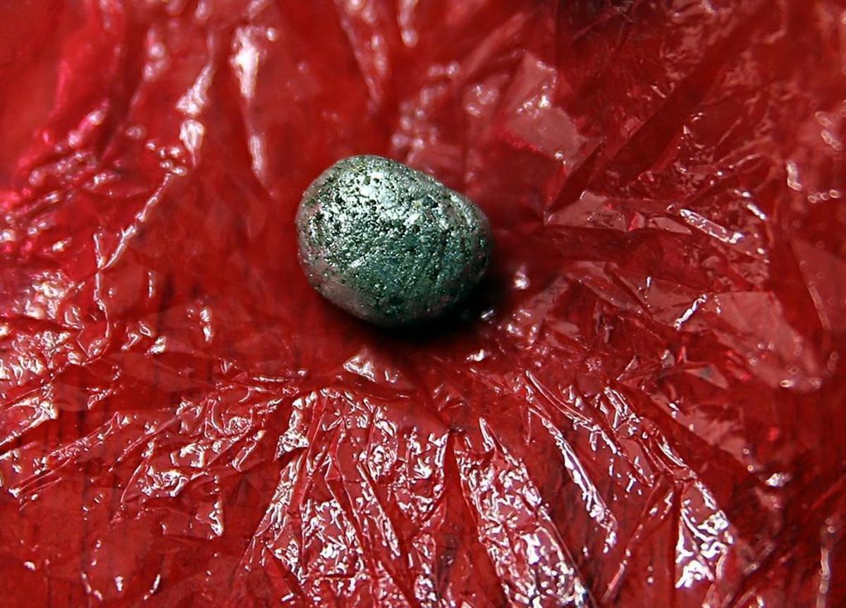 A rock ball containing crude gold will be melted to extract the precious metal at a gold-buying store in Segovia, a mining town in the Antioquia department in Colombia, on May 8, 2017.