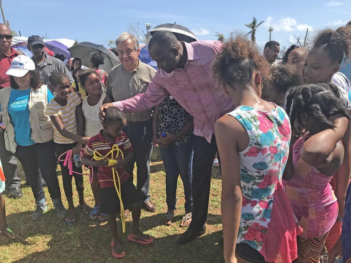 United Nations Secretary General António Guterres (left) and Dominica Prime Minister Roosevelt Skerrit meet with children in Salybia, a farming village in Dominica’s Kalinago territory. Skerrit and Guterres both spoke about the need to fight climate change.