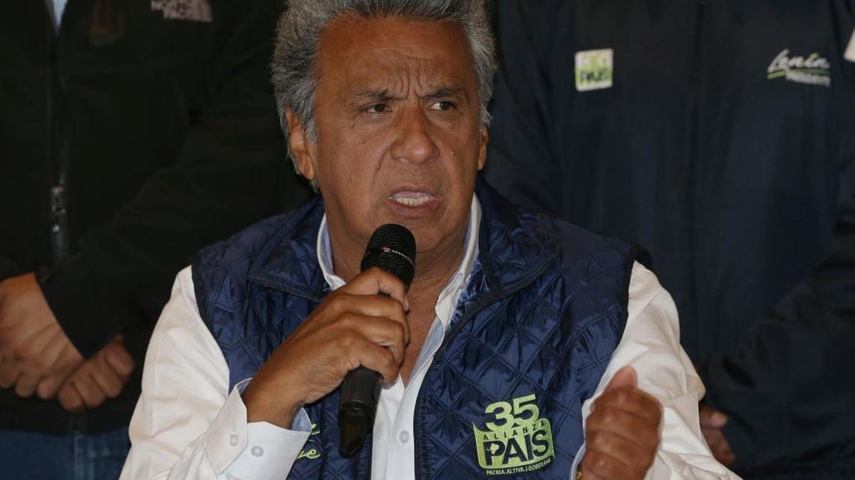 Lenin Moreno, presidential candidate for the ruling party Alliance PAIS, center, speaks during a news conference where he said, "no to violence" as Ecuadoreans wait for results of the presidential race, in Quito, Ecuador, on Monday.
