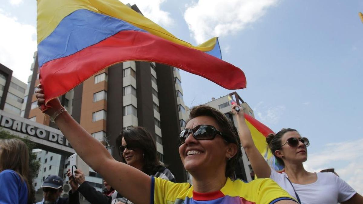 Opposition presidential candidate Guillermo Lasso's supporters protest outside Ecuador's National Electoral Council to demand the official results of the presidential elections, in Quito, Ecuador, Monday, Feb. 20, 2017. The hand-picked candidate of socialist President Rafael Correa headed to victory in the opening round of Ecuador's presidential election, although it was uncertain whether he would get enough votes to avoid a runoff against Lasso, his nearest rival.