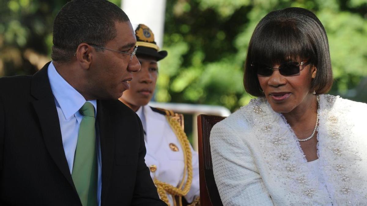 Andrew Holness, left, will take over for Jamaica Prime Minister Portia Simpson Miller, right.