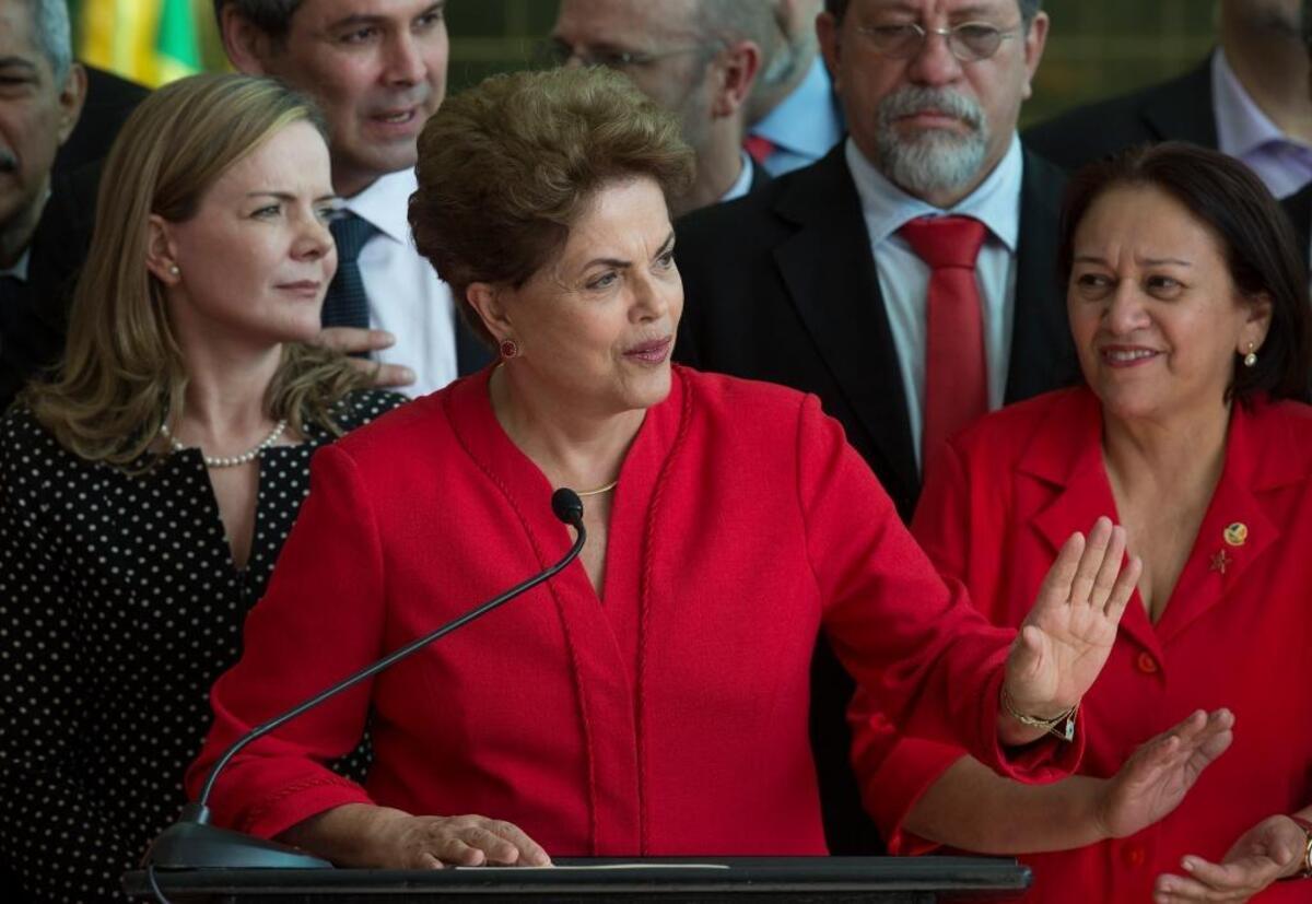 Brazil's ousted President Dilma Rousseff speaks to supporters from the official residence of the president, Alvorada Palace, in Brasilia on Aug. 31, 2016, in her first remarks since her impeachment. “They think that they beat us, but they are wrong,” she said.