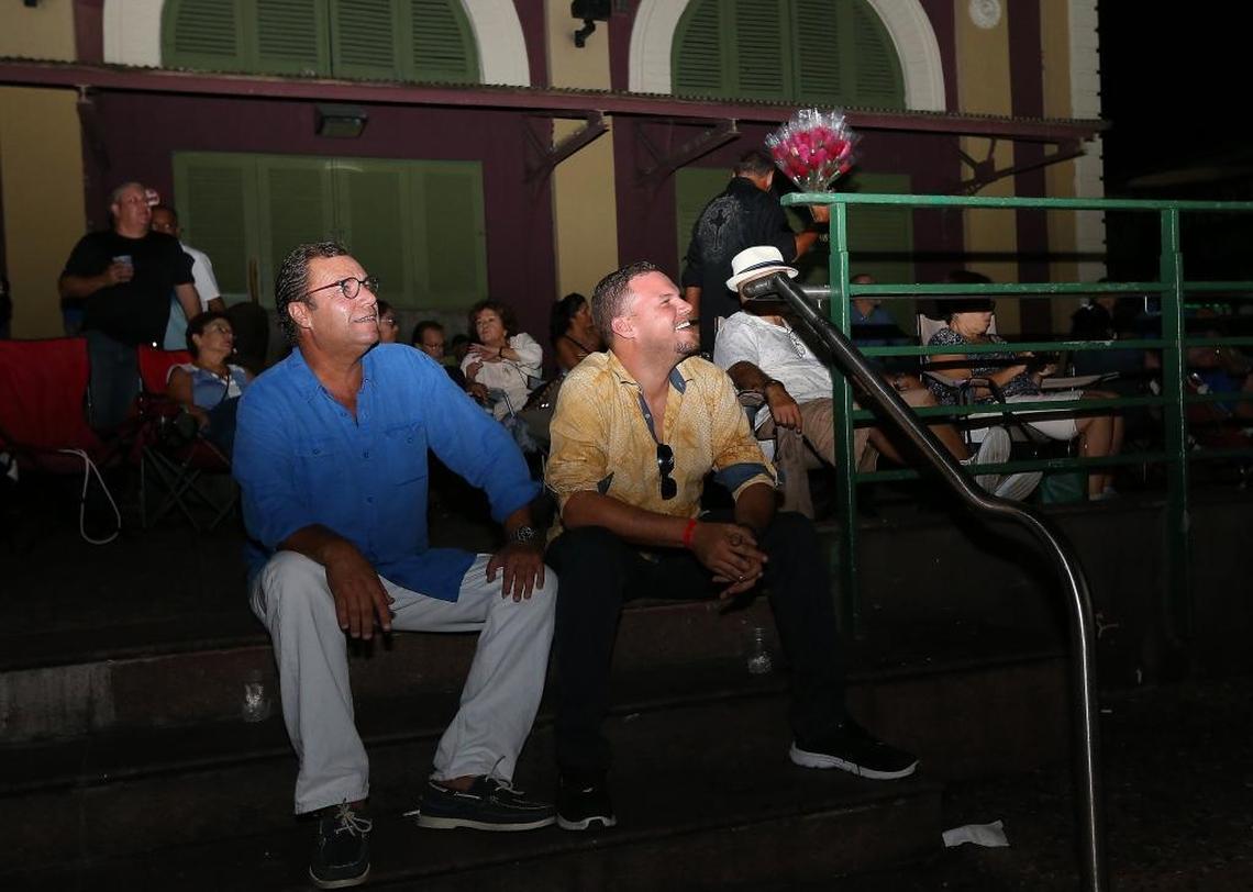 William Fernandez Mascaro alongside his son William Fernandez Chambers watches the Astros play the Los Angeles Dodgers in Game 2 of the World Series in San Juan.