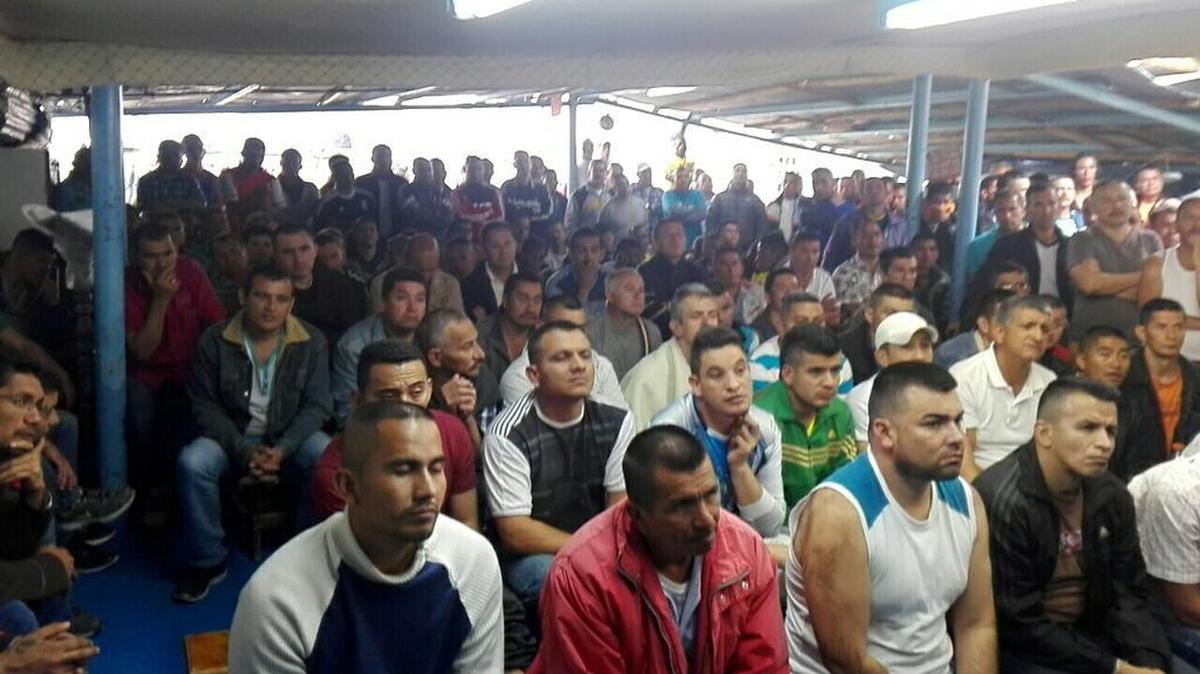 Members of the Revolutionary Armed Forces of Colombia, or FARC, gather for a jailhouse meeting in Bogotá, Colombia. Under the terms of a new peace deal, hundreds of guerrillas will receive amnesties or alternative sentences.