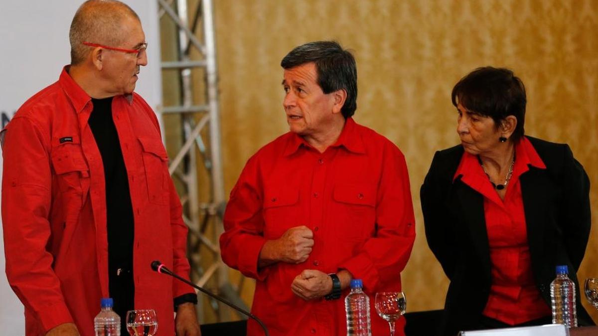 Antonio Garcia, chief negotiator of the National Liberation Army, or ELN, left, along with rebels Pablo Beltran and Marian Elena Velazco, confer during a signing agreement to start peace talks, in Caracas, Venezuela, on Wednesday, March 30, 2016. The Colombian government’s formal peace talks with the ELN, the country’s second-largest rebel group, heighten expectations for a definitive end to a half-century of political violence in the Andean nation.