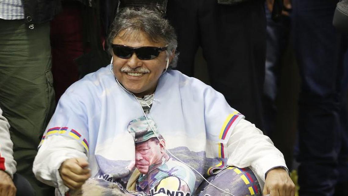 Former rebel leader Jesus Santrich attends a press conference announcing the new political party Alternative Communal Revolutionary Forces, in Bogota, Colombia, on Sept. 1, 2017. Members of the Revolutionary Armed Forces of Colombia, or FARC, voted overwhelmingly to change the group's name to the Alternative Communal Revolutionary Forces, scrubbing any reference to its armed past. Since both names in Spanish carry the acronym FARC, its common use name will remain unchanged.