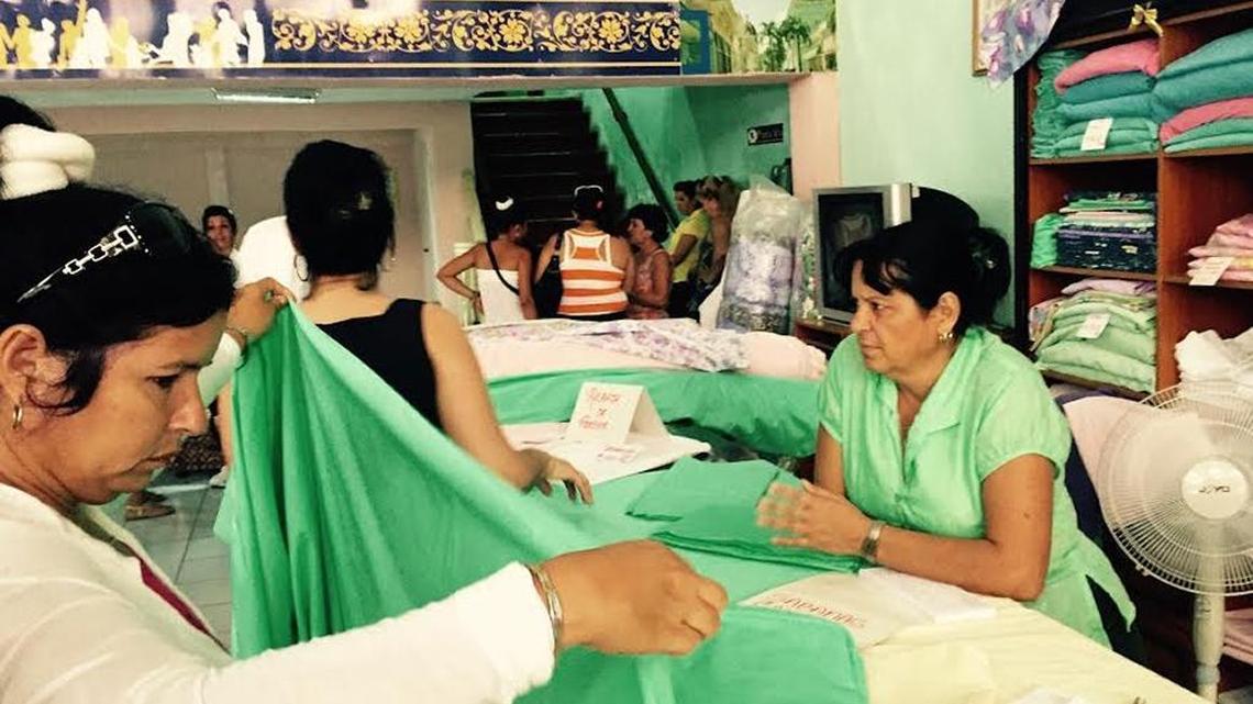 Cuban consumers peruse the goods at a store in Cienfuegos. A new survey shows that Cubans’ income is higher than average state salaries would indicate.