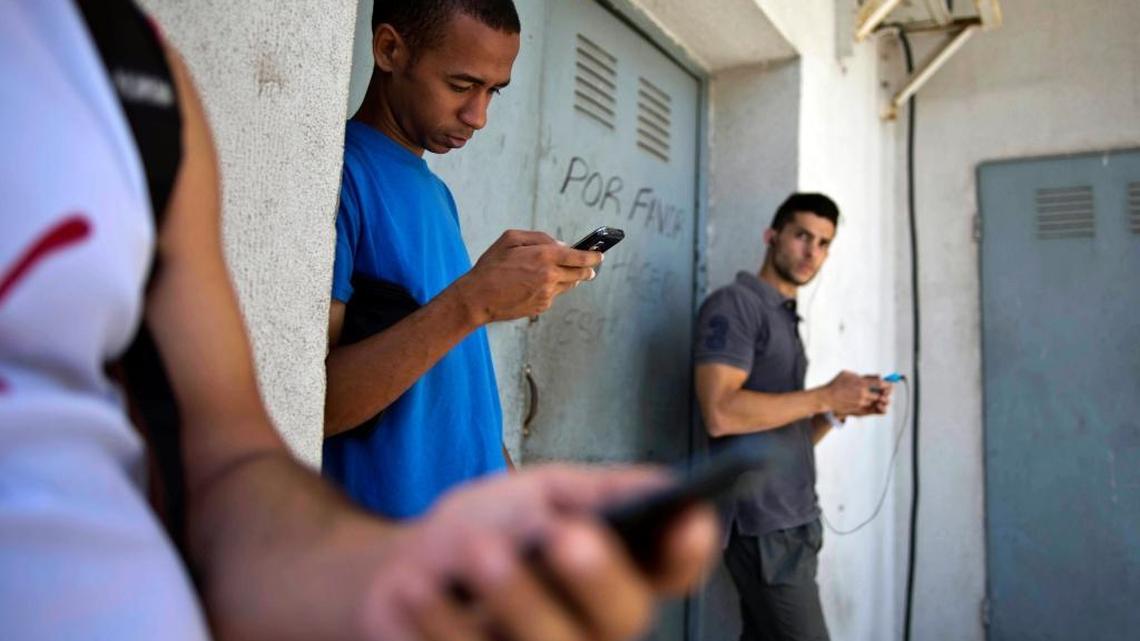 Students stand outside a building to find an internet signal for their phones in Havana, Cuba. The Associated Press reported in 2014 that USAID secretly created a primitive social media program, staged a health workshop to recruit activists and infiltrated Cuba’s hip-hop community. The State Department budget for fiscal year 2018 doesn’t contain a funding request for USAID programs in Cuba.