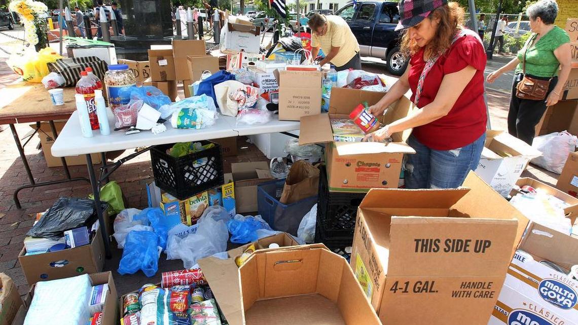 Alma Aguilera helps organize donations to be transported to Mexico to help Cubans stranded in that nation following the end to an immigration policy known as “wet foot, dry foot.”