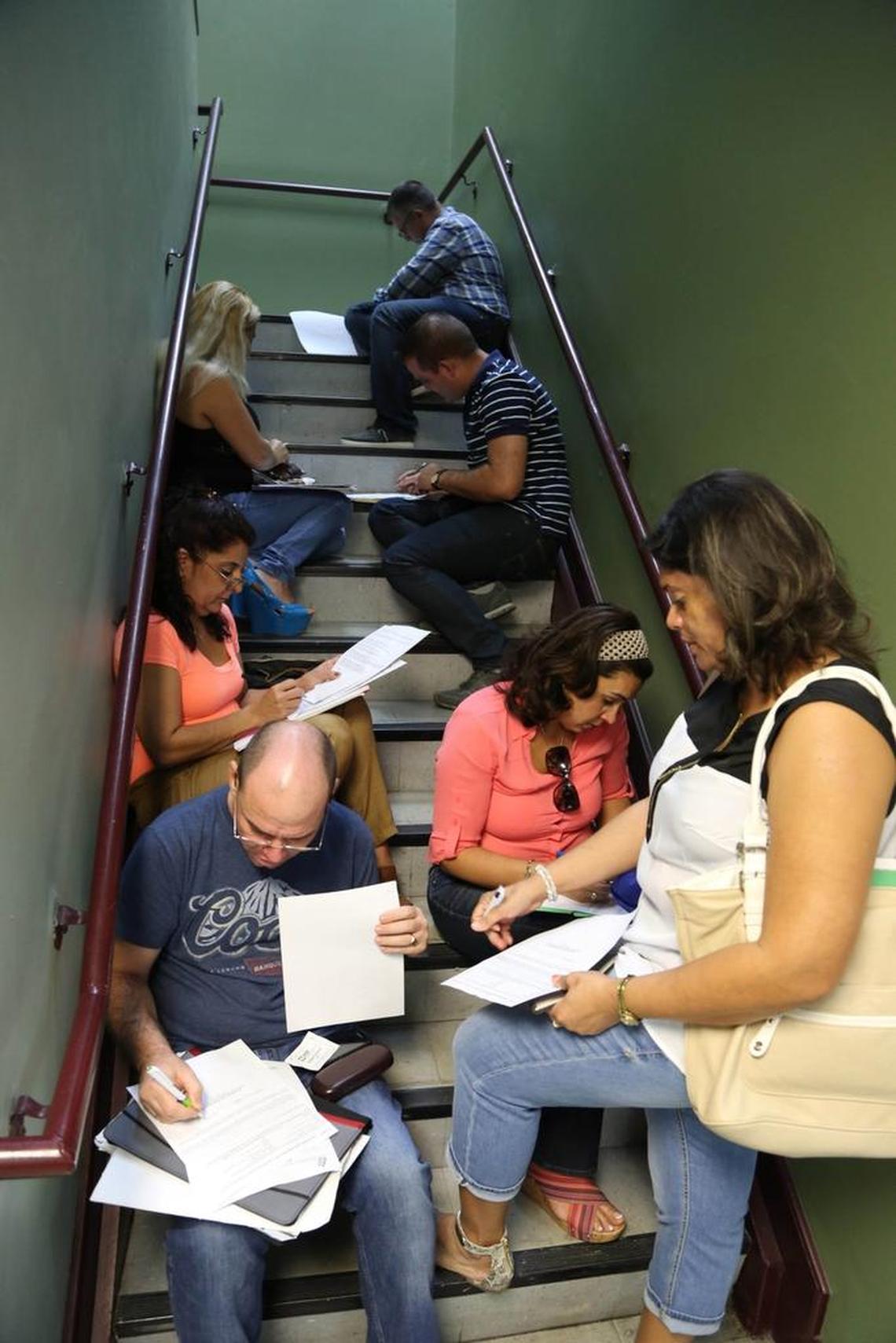 Hundreds of health professionals gather at a job fair hosted by Solidarity Without Borders in Hialeah in 2014. Thousands of Florida immigrant doctors are seeking to re-enter their workforce.