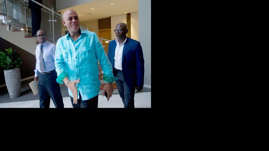 
Haitian President Michel Martelly departs following meetings with members of opposition parties Port-au-Prince. 
