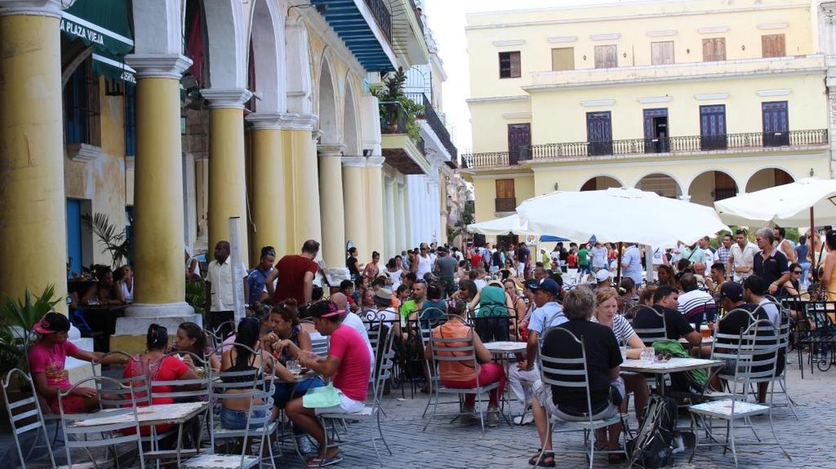 Visitors crowd an Old Havana cafe in July 2015. Cuba’s burgeoning tourism industry presents challenges as well as opportunities for the rest of the Caribbean.