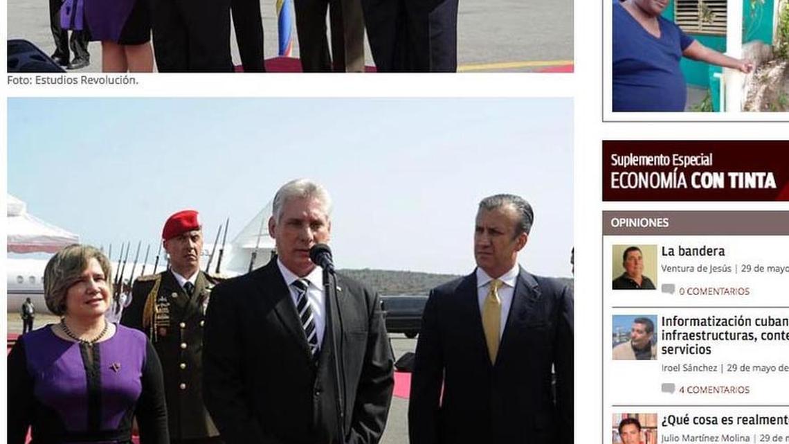 This screen shot from Granma, the newspaper of Cuba’s Communist Party, shows Cuban leader Miguel Díaz-Canel as he arrives for an official visit to Venezuela, but it doesn’t identify the woman in the purple and black dress. She is Lis Cuesta Peraza, the wife of Díaz-Canel.