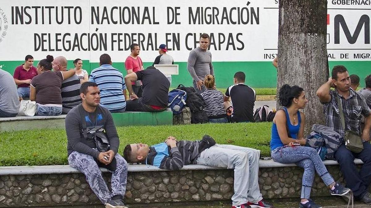 File photo of Cuban migrants waiting to be processed outside the Mexican National Institute of Migration.