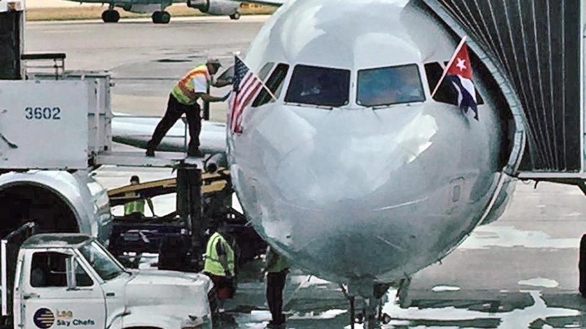 An American Airlines jet is prepared for its inaugural scheduled service from Miami to Cuba.