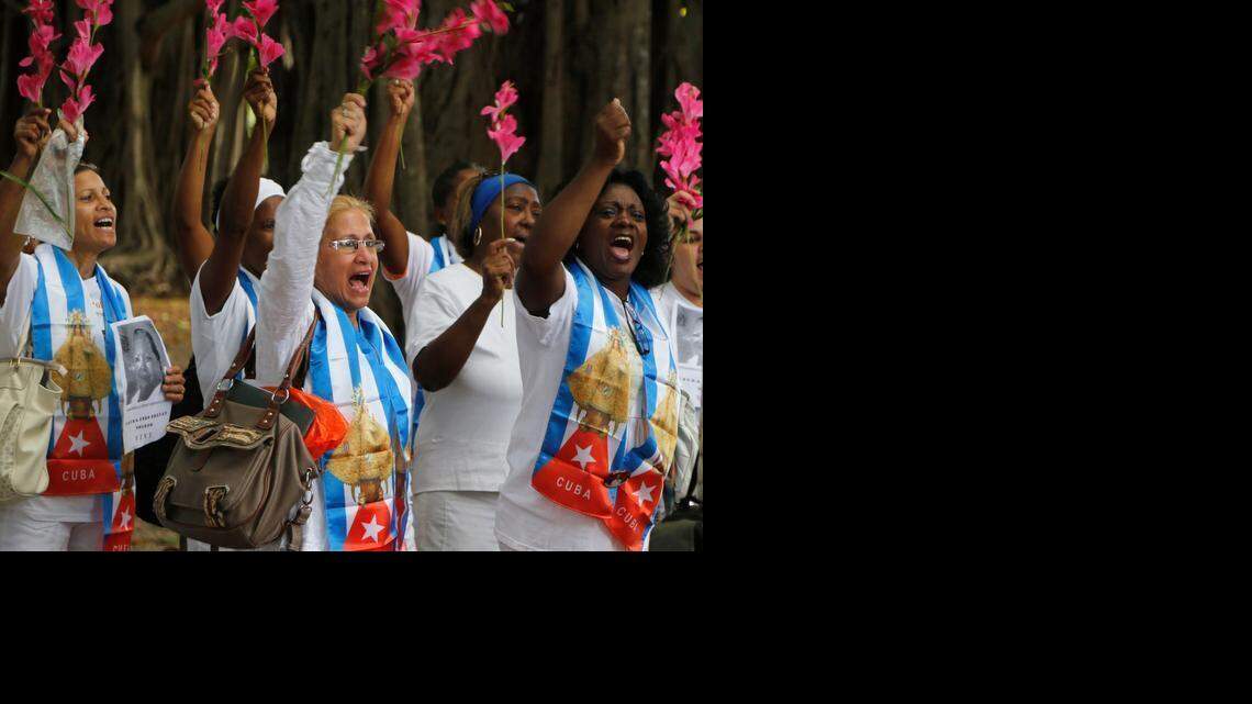 
Members of the Cuban dissident group Ladies in White participate in a demonstration in Havana, Cuba, on Sunday Dec. 28, 2014. The new U.S.-Cuba detente is already upending the civil society Obama hopes to strengthen. The prospect of engagement between the two former Cold War antagonists seems to be undercutting the island’s hard-line dissidents while boosting more moderate reformers who want to push President Raúl Castro gradually toward granting citizens more liberties.
