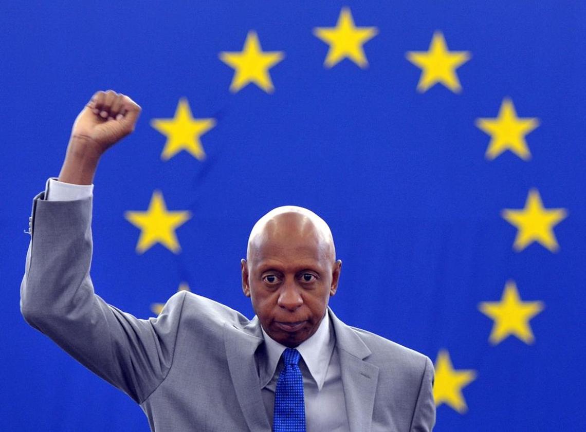 In this July 3, 2013 file photo, Cuban dissident Guillermo "Coco" Farinas raises his fist as he receives the Sakharov Prize for Freedom of Thought at the European Parliament in Strasbourg, eastern France.