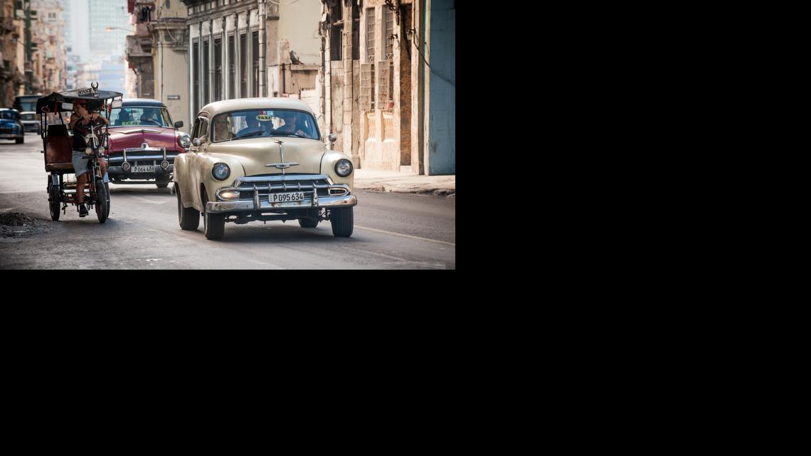 
Old American cars are seen in a street of Havana, on December 19, 2014. The U.S. could be a source of the parts needed to keep the vintage cars running.
