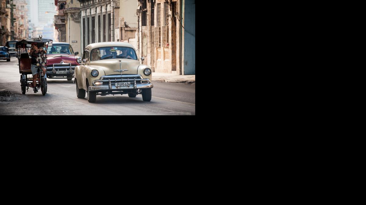 
Old American cars are seen in a street of Havana, on December 19, 2014. The U.S. could be a source of the parts needed to keep the vintage cars running.
