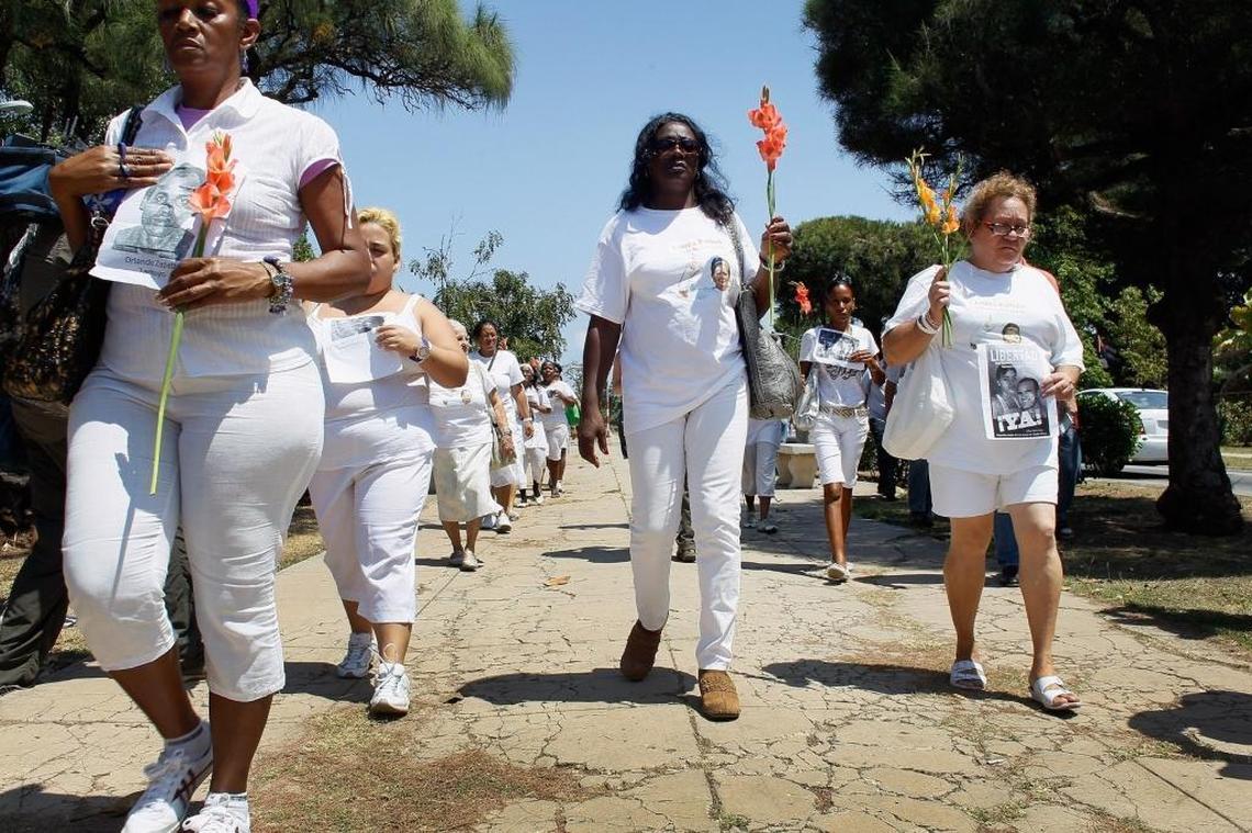Berta Soler, center, leader of the Damas de Blanco, marches with other women of the organization after attending mass in Havana in March 2012.