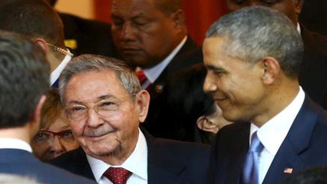 PRELUDE:  President Barack Obama, right, and Cuban President Raúl Castro, center, talk with an unidentified man before the inauguration of the Summit of the Americas in Panama City on Friday.