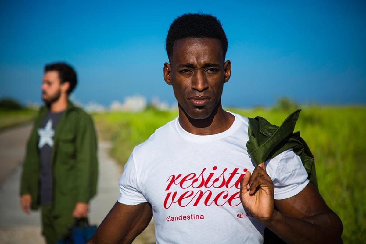 A few of the politically ambiguous T-shirt designs offered online by Clandestina: The one in the foreground says “Resist and Overcome.” The shirt sported in the background is the company’s “Another Star” design.