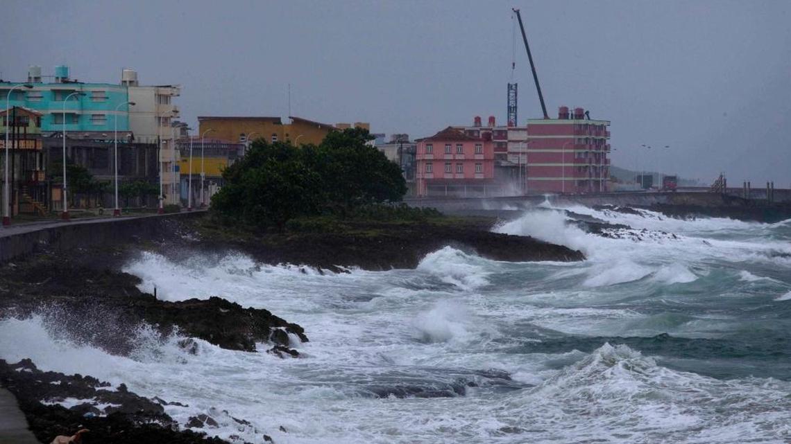 Waves crash against a seawall in Baracoa, Cuba, before the arrival of Hurricane Matthew Tuesday.