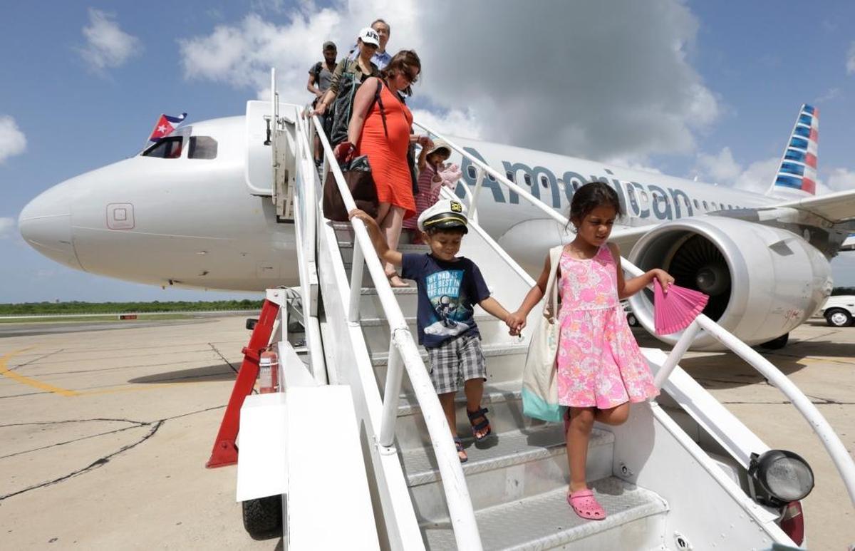 Passengers arrive in Cienfuegos, Cuba, on American Airlines inaugural scheduled service from Miami on Sept. 7, 2016. Some airlines have already begun to cut back on their Cuba service.