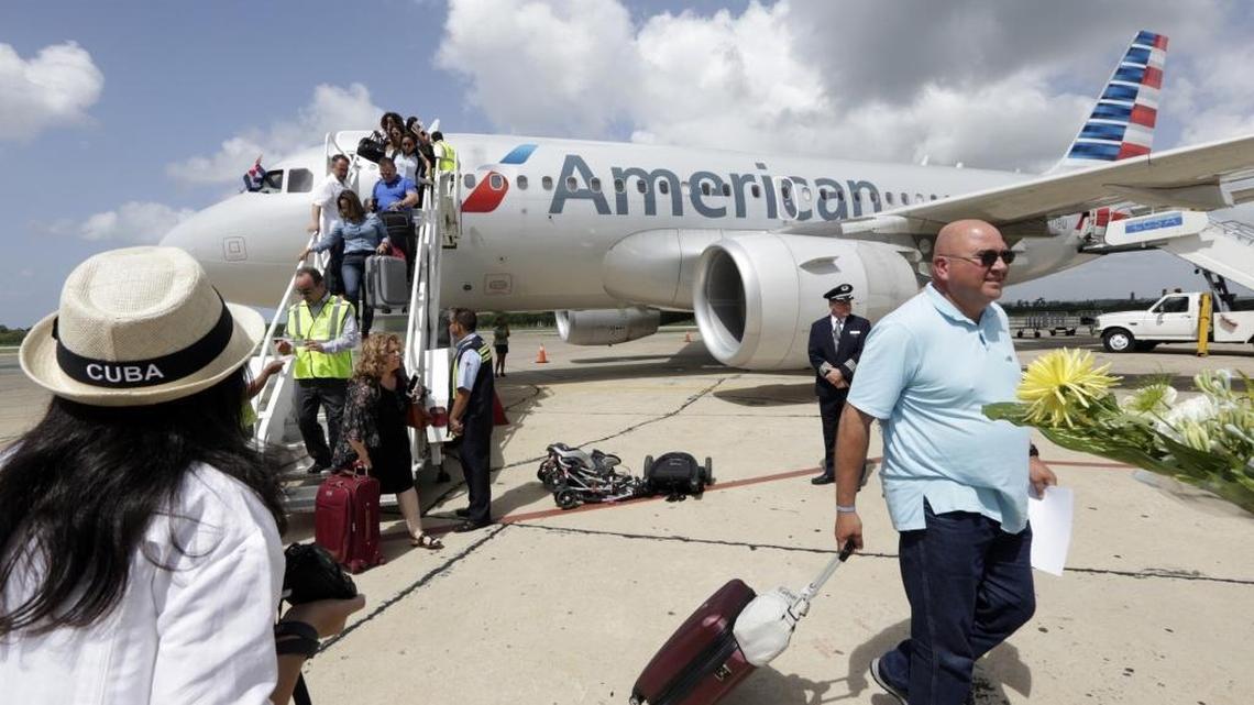 Passengers deboard an American Airlines jet on arrival to Cienfuegos, Cuba for the company’s inaugural flight from Miami to the island.