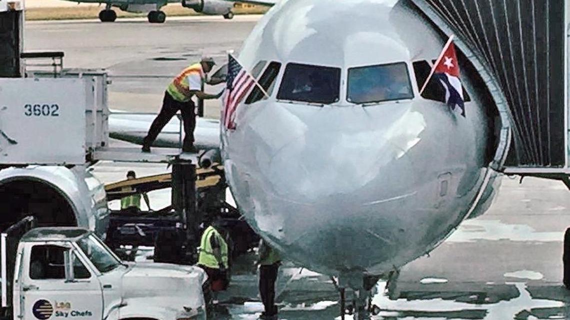 An American Airlines jet is prepared for the inauguration of AA’s regularly scheduled service from Miami to Cienfuegos on Sept. 7, 2016. American says its last flight to Cienfuegos will be Jan. 8, 2018.