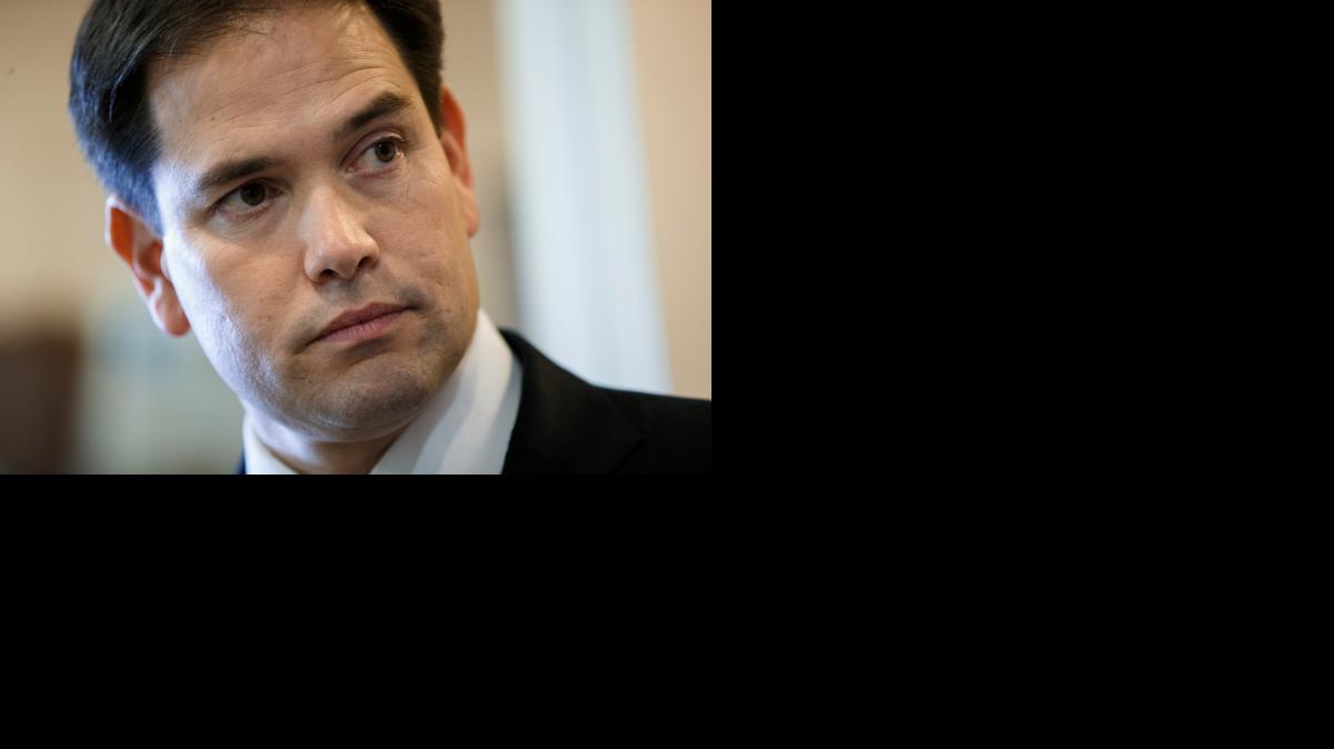
Sen. Marco Rubio, R-Fla., the son of Cuban immigrants, waits to make a statement at a news conference where he expressed his disappointment in President Barack Obama's initiative to normalize relations between the United States and Cuba, at the Capitol in Washington, Wednesday, Dec. 17, 2014. 
