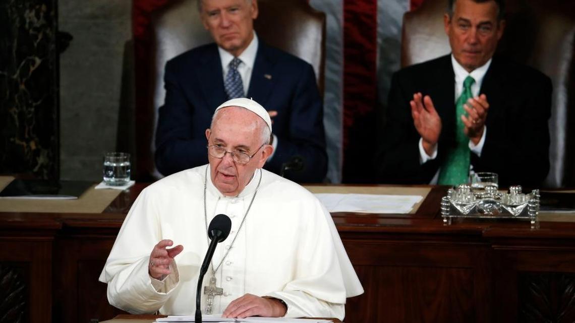 
Pope Francis addresses a joint meeting of Congress on Capitol Hill in Washington, Thursday, Sept. 24, 2015. Listening behind the pope are Vice President Joe Biden and House Speaker John Boehner of Ohio.
