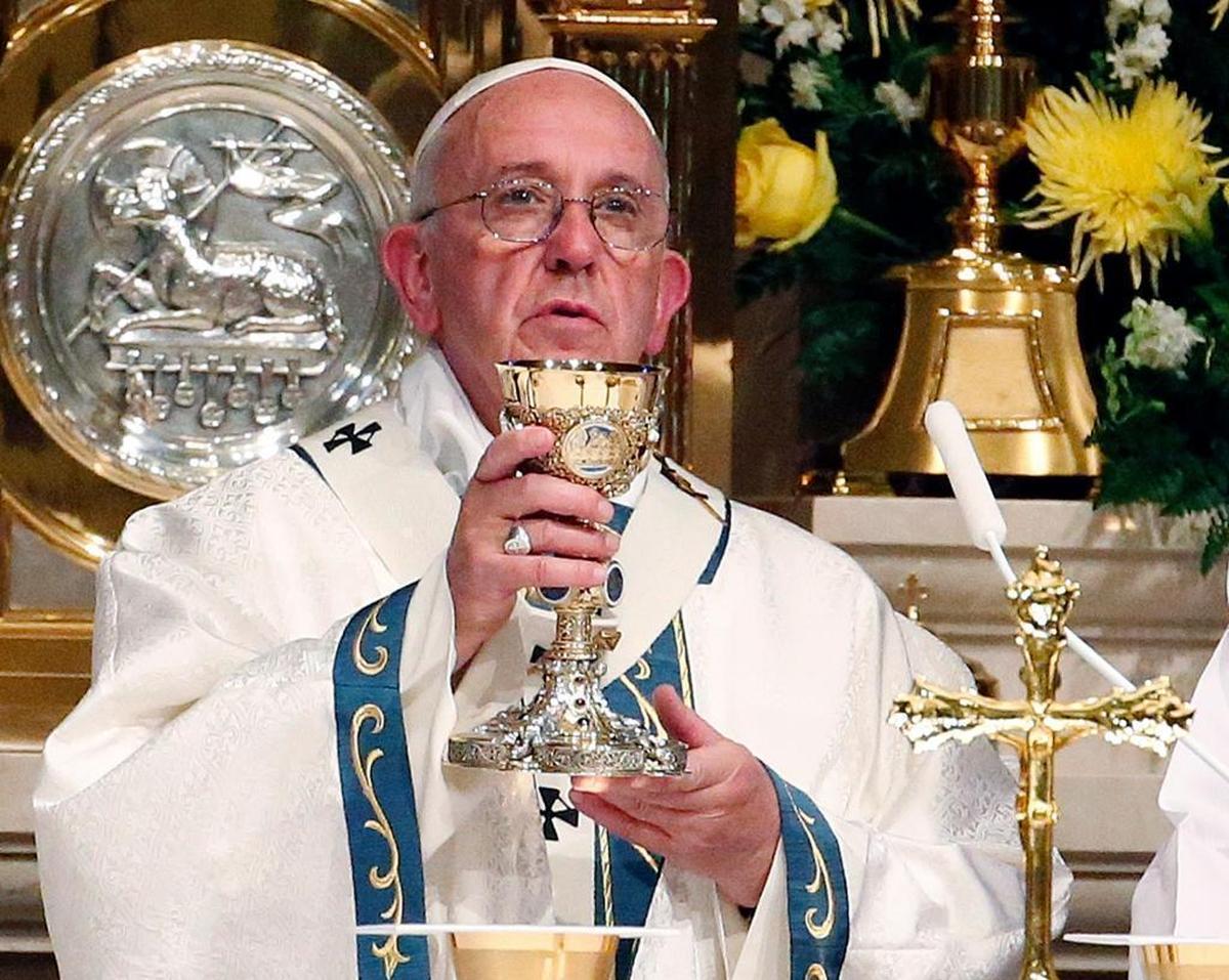 Pope Francis blesses the Blood of Christ during a Mass at Cathedral Basilica of Sts. Peter and Paul, Saturday, Sept. 26, 2015, in Philadelphia.